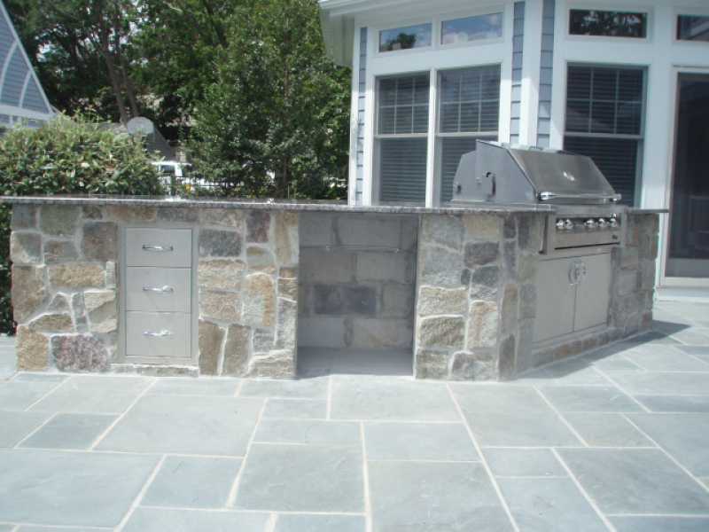 Backyard Stone Kitchen and Patio Custom Design