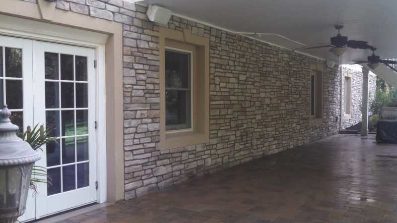 Backyard Stone Wall with Covered Area