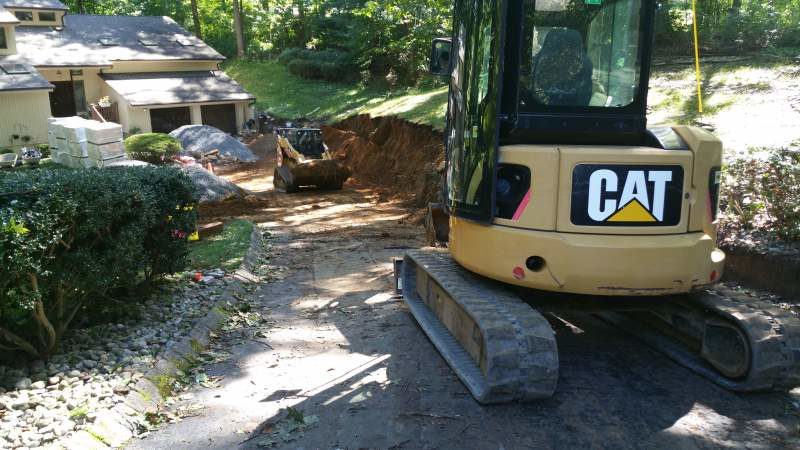 Bobcat Contractors Installing Retaining Wall NJ