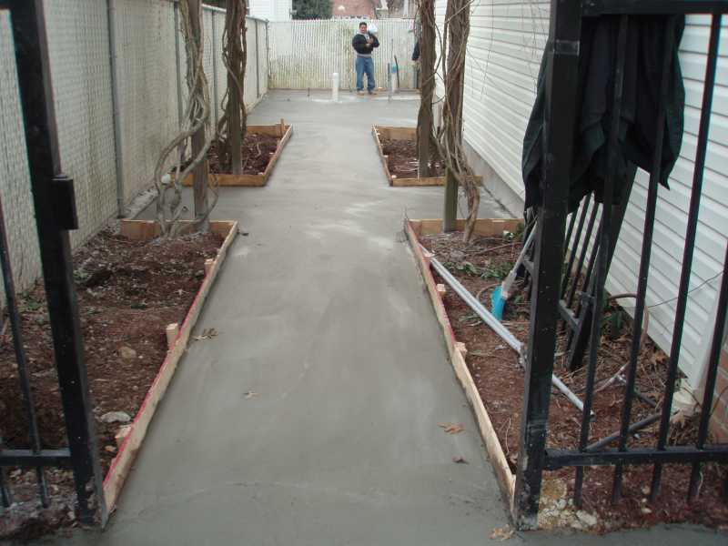 Concrete Walkway with Landscaping Design