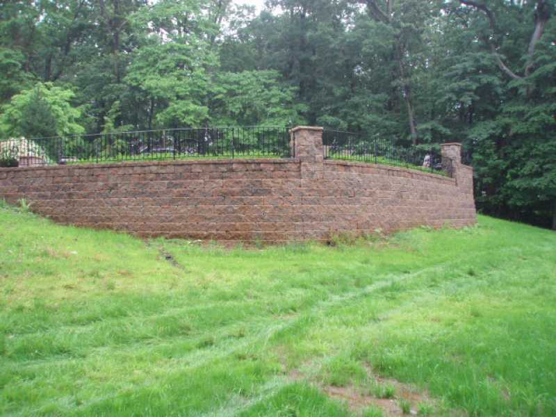 Custom Backyard Landscaping with Retaining Wall