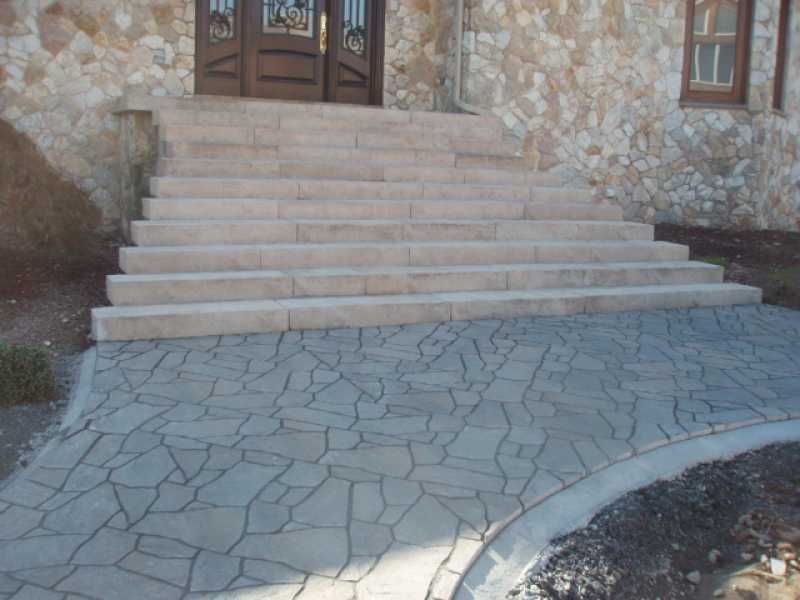 Custom Front Stairway and Stonework Entryway