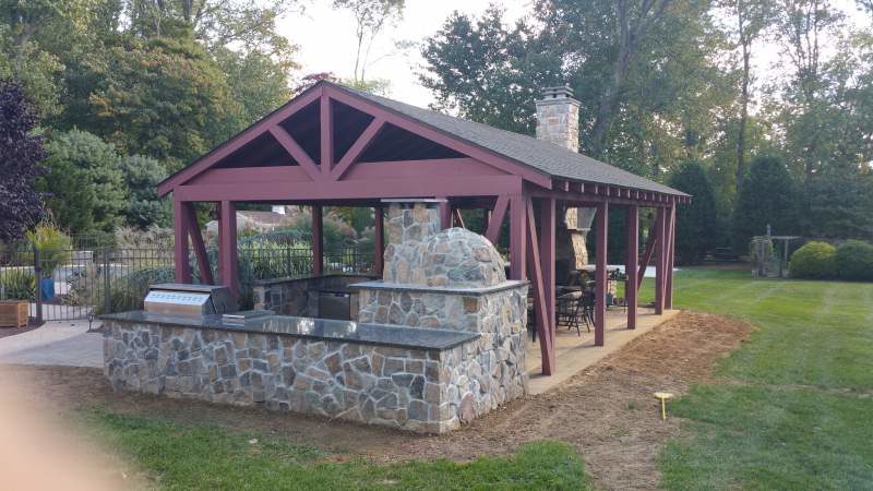 Custom Masonry Outdoor Kitchen with Stone Oven