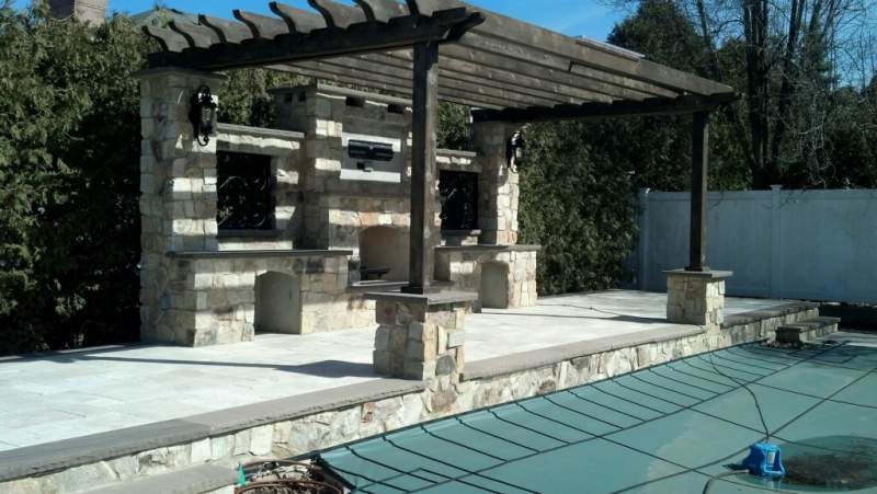 Custom Pool Deck with Fireplace Entertainment