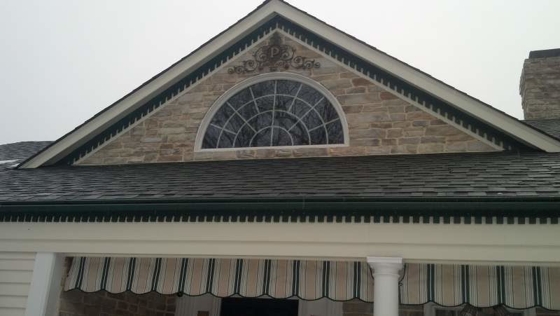 Custom Stone Dormer by MIllenium Stoneworks