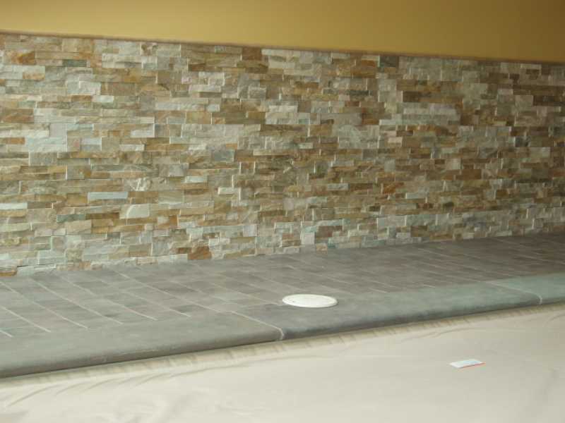Custom Stone Wall with Covered Pool