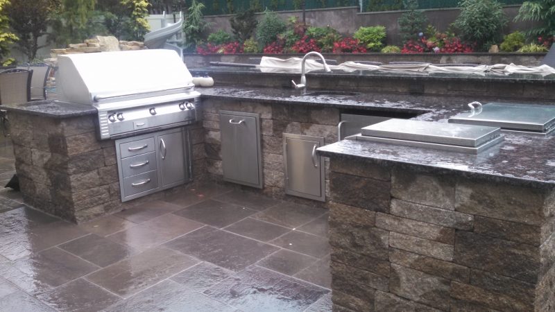 Custom Stonework Kitchen with Grill and Sink