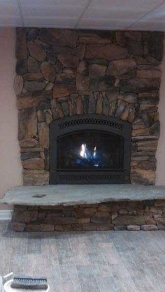 Indoor Fireplace with Custom Masonry Design