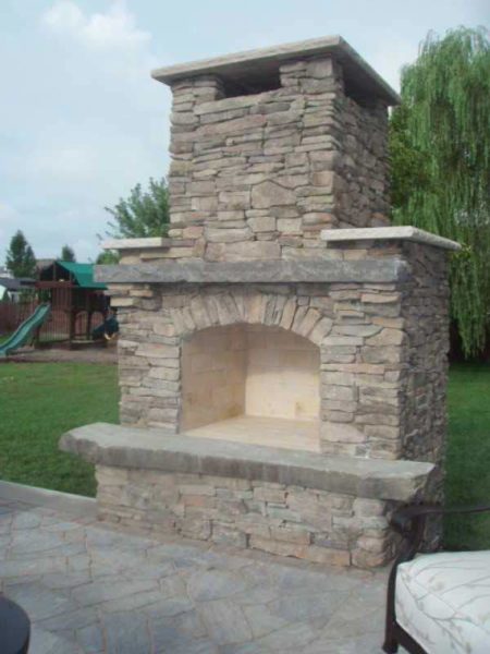 Millenium Stone Works Custom Backyard Fireplace