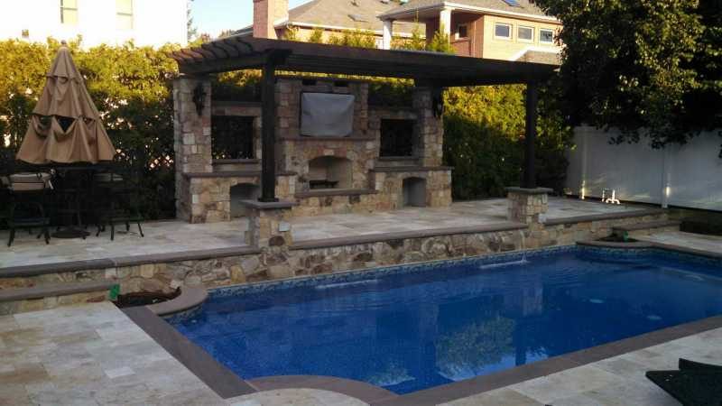 Outdoor Entertainment with Pergola over Fireplace