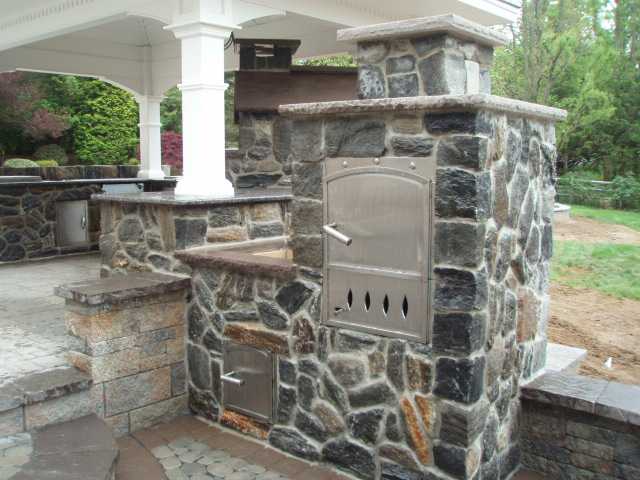 Outdoor Kitchen with Custom Stone Oven