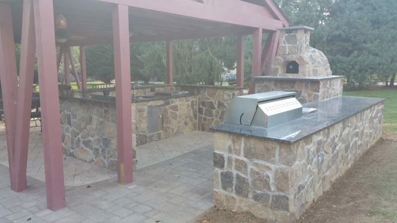 Outdoor Kitchen with Grill and Stone Oven