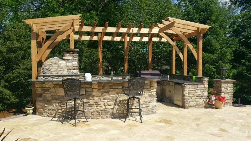 Outdoor Kitchen with Seating and Pergola