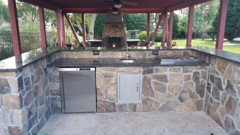 Outdoor Stonework Kitchen with Covered Area