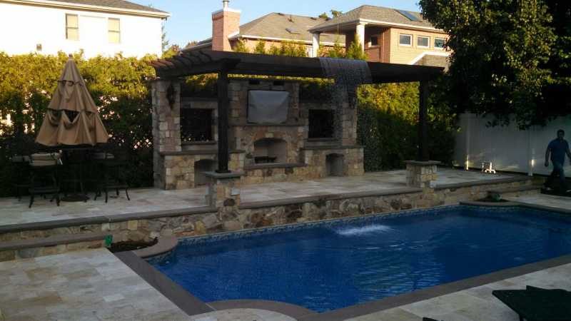Pool Deck with Seating and Custom Fireplace