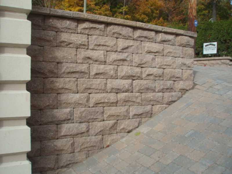 Sloped Driveway With Custom Retaining Wall Millenium Stoneworks - Retaining Wall Steep Driveway