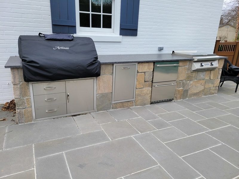 outdoor kitchen with new patio