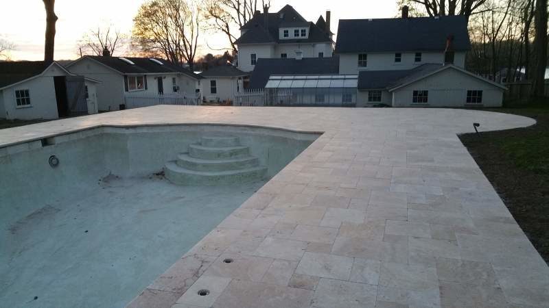 large stone pool deck